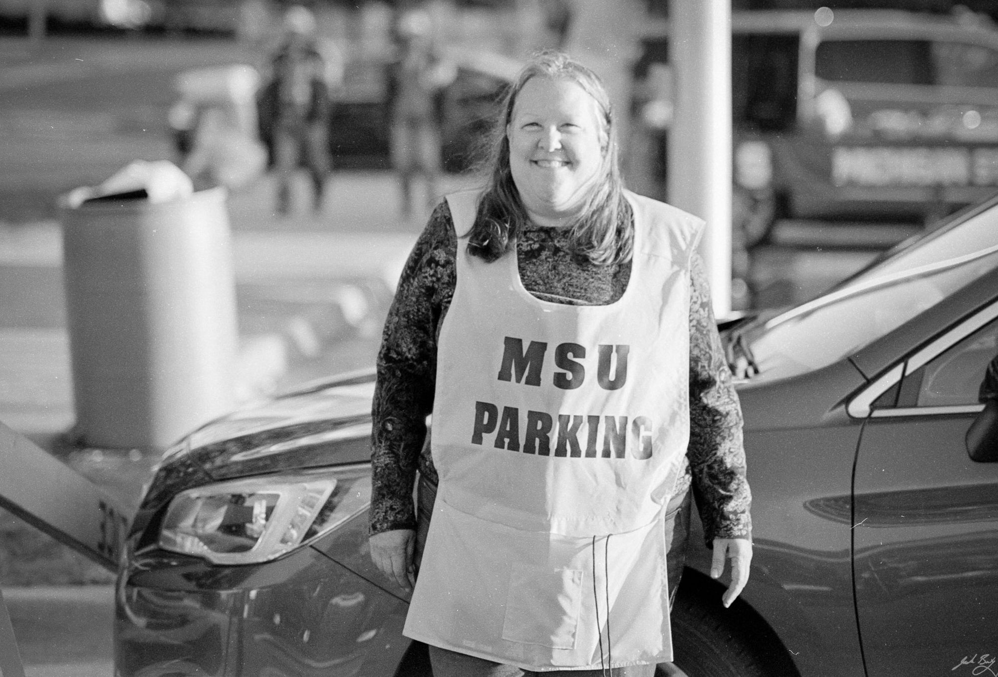 MSU parking attendant. (Olympus OM-1n. Zuiko 85mm f/2.0)